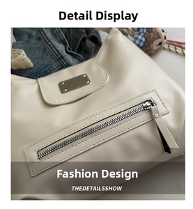 Detailansicht der Nähte des beigen Lederrucksacks, Metallreißverschluss und Beschläge