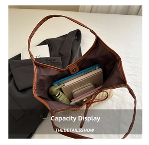 Spacious woven tote bag interior showing capacity for umbrella, wallet, and books