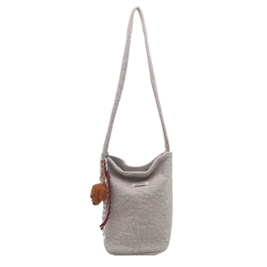 Winter light grey wool shoulder bag with teddy bear pendant and woven red rope detail