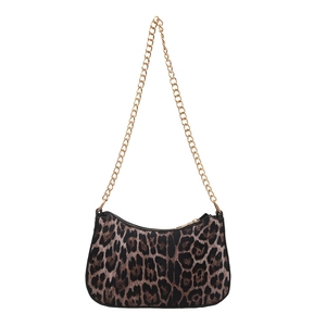 Classic leopard print crescent shoulder bag with a gold metal chain strap on white background