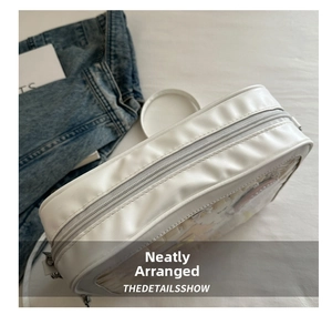 Top view of white PU leather square bag with clear PVC window and silver metal rings