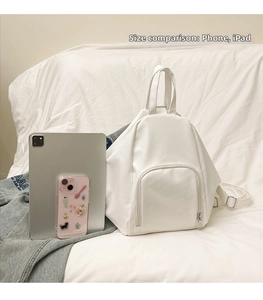 Size comparison of the white minimalist PU leather tote bag with a mobile phone and iPad