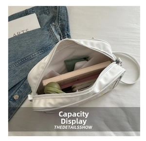 Internal view of the white transparent ita bag showing large storage capacity for books