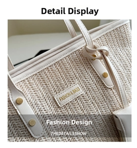 Close-up of beige woven tote bag with leather trim and gold rivet details