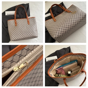 Makro-Detailansicht der großen Tote Bag mit Monogramm-Canvas und Ledergriffen
