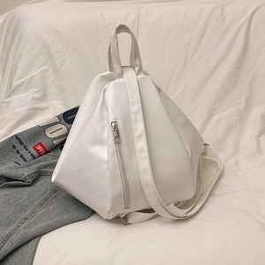 Minimalist white geometric backpack in smooth PU leather with 3D prism structure design