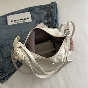 Schicke beige Handtasche aus Kunstleder mit Spitzenschleife, modisch und vielseitig im Alltag