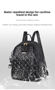 Close-up of black quilted backpack featuring waterproof shell and golden stud accents