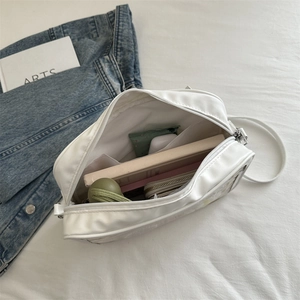 White Japanese JK style shoulder bag with spacious interior for books and daily items