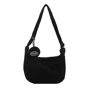 Black corduroy crescent crossbody bag with adjustable strap and small coin purse attachment