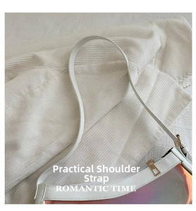 Detail of white leather shoulder strap and iridescent panel with golden zipper closure