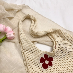 Chic beige crochet tote bag with red flower pattern and knit mesh for summer style