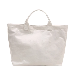Minimalist white glossy tote bag with embossed lettering on a clean white background