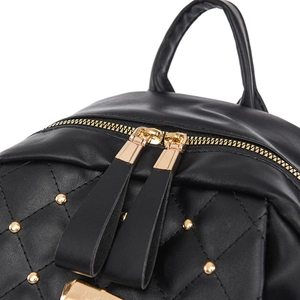Black quilted faux leather backpack for women with gold rivets and dual zipper system