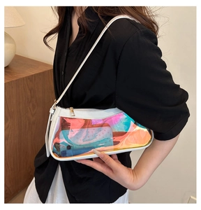 Close-up of a laser iridescent shoulder bag showing transparent holographic material details