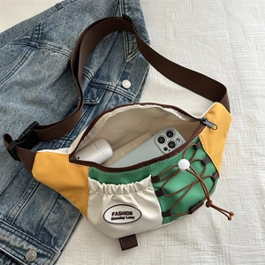 Sac bandoulière rétro en toile bicolore avec sangle réglable et grande capacité de rangement