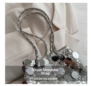 Close-up of the silver sequin shoulder bag featuring a stylish chain-leather spliced strap