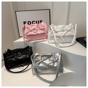 Soft PU tote bag with bow detail and ruched design in pink white black and silver