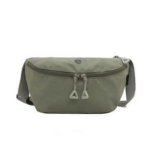 Minimalist green nylon crescent waist bag with adjustable grey strap and metal logo