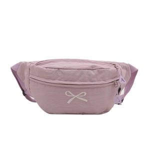 Pale purple bow-knot crossbody bag with dual zippers and adjustable strap on white background