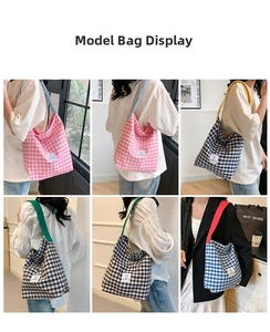 Detail of plaid canvas tote bags in pink, blue and brown with contrast shoulder straps