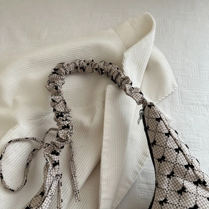 Gingham canvas tote bag with black bow print and trendy scrunchie handle for women