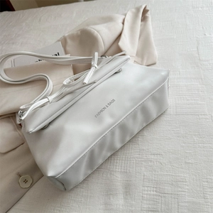 Minimalist white PU leather tote bag with knot decoration and Fashion & Bags text print