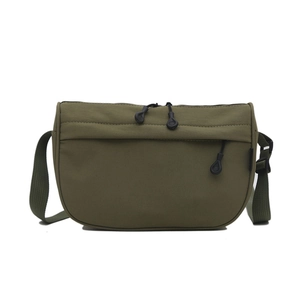 Minimalist olive green crescent shoulder bag in waterproof nylon with adjustable strap