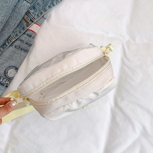 Creamy white nylon crossbody bag with clear PVC window and yellow woven strap