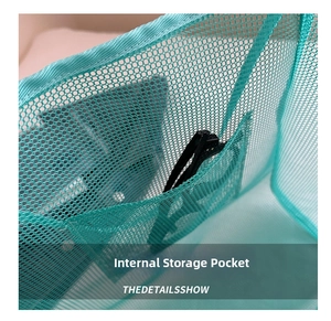 Detail showing the internal storage pocket of a green mesh tote bag with sunglasses
