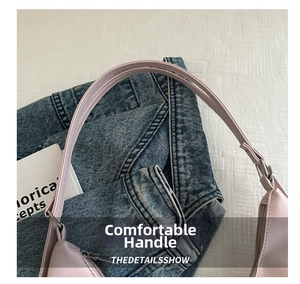 Close-up of pink leather tote bag handle with silver buckle and fine stitching details