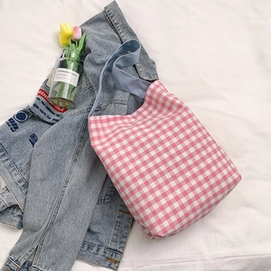 Large capacity pink gingham canvas tote bag for women with light blue handles for commuting