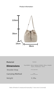 Detailed size specifications of the beige canvas drawstring bucket bag with measurements
