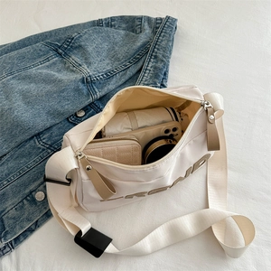 Large capacity oxford fabric crossbody bag in beige with embroidery and wide shoulder strap