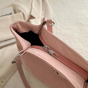 Pink faux leather butterfly tote bag with silver hardware for 2024 fashion commute