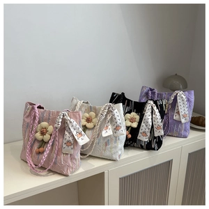 Chic embroidered canvas tote bag with floral pendant and ribbon detail in four colors