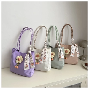 Stylish canvas tote bags in four pastel colors with silk scarves and floral charms