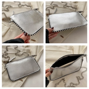 Detailed views of silver metallic chain bag with bead trim and textured leather finish