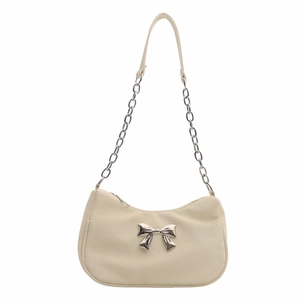 Elegant beige underarm bag with silver metal bow and chain shoulder strap for women