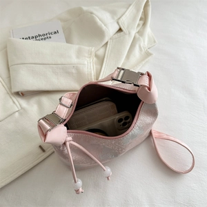 Pink jacquard half-moon shoulder bag with floral patterns and pearl drawstring details