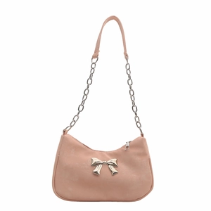 Pink leather shoulder bag with silver chain strap and metal bow detail on white background