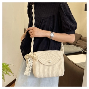 Beige hand-woven shoulder bag with pearl clasp and lace bow for women in casual style