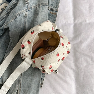 Vintage corduroy strawberry print crossbody bag with white wide strap and zipper closure