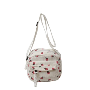 Lightweight white corduroy crossbody bag with cute strawberry print and adjustable strap