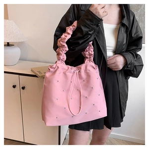 Pink pleated handle tote bag with silver rhinestone studs and drawstring detail