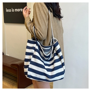 Striped canvas tote bag with large capacity and dual straps for casual daily use