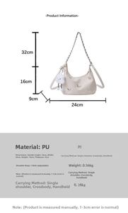 Detail view of white butterfly print tote with plush charm and sizing specifications