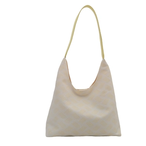 Minimalist cream tote bag with yellow geometric stripes and hobo shoulder strap