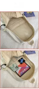 Detailed view of large capacity interior with dual pockets for tablets and smartphones