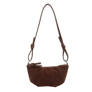 Modern brown suede crescent shoulder bag with pleated design and knotted strap details